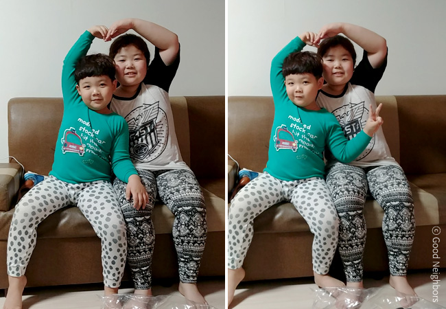 한별이와 산이가 함께 하트를 그리고 있는 이미지